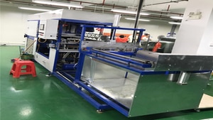 Thermoform machine used to make custom blister packaging products.